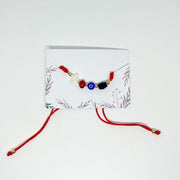 BISUTERIA - PULSERA CON AZABACHE, OJO TURCO Y CRUZ - FamilyBox.Store enviar a venezuela ship to venezuela supermercado online venezuela online supermarket